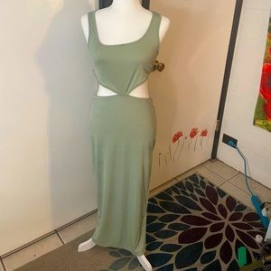 Mint colored side cutout maxi dress with ribbed texture and side slit in skirt
